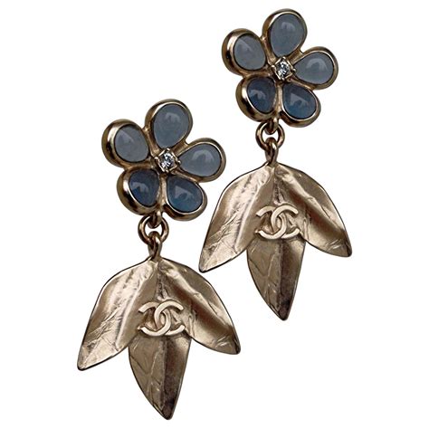 boucles d'oreil chanel|boucles d'oreille camélia Chanel.